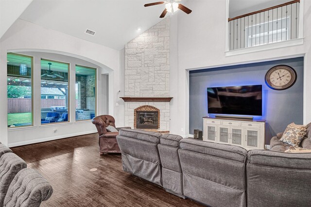 1651 Old Oak Ct, Prosper, TX 75078 - living room with ceiling fan, wood finished floors, a fireplace, high vaulted ceiling, and baseboards