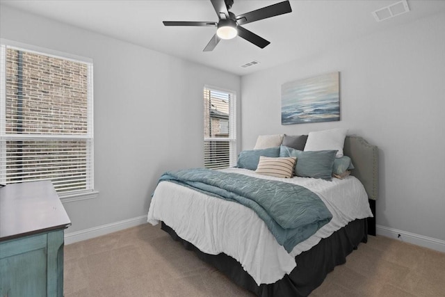 929 Lady Tessala Ave, Lewisville, TX 75056 - bedroom with light carpet, baseboards, and a ceiling fan