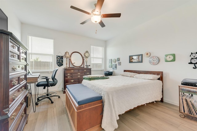 968 Manuel Dr, Fate, TX 75087 - bedroom with light wood finished floors, baseboards, an office area, and a ceiling fan
