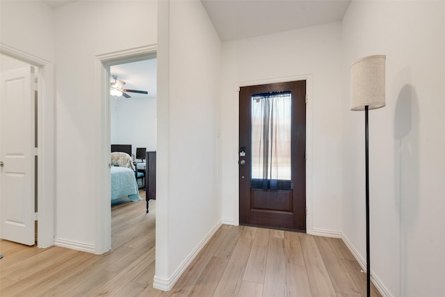 968 Manuel Dr, Fate, TX 75087 - foyer featuring light wood-style flooring, baseboards, and ceiling fan