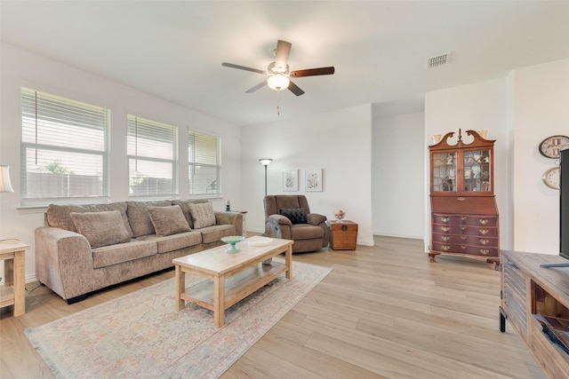 968 Manuel Dr, Fate, TX 75087 - living area featuring a ceiling fan and light wood finished floors