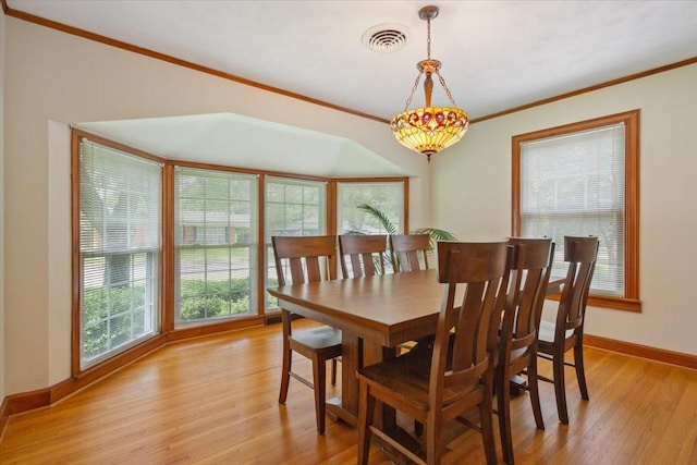 3808 Huaco Ln, Waco, TX 76710 - dining space featuring crown molding, light wood-style flooring, and baseboards