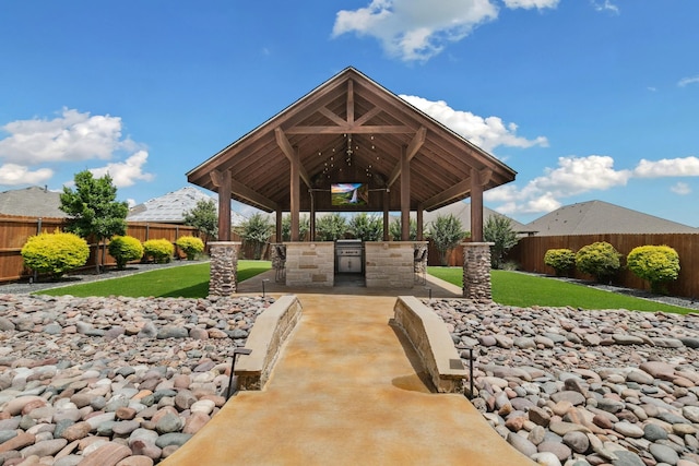 15236 Holly Bay Ct, Aledo, TX 76008 - fenced backyard featuring exterior kitchen, a gazebo, and a patio
