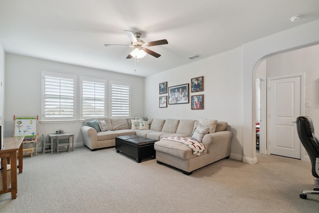 15236 Holly Bay Ct, Aledo, TX 76008 - living room featuring a ceiling fan, carpet flooring, and arched walkways