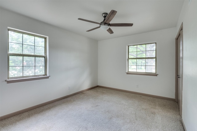 2000 Bettibart St, Fort Worth, TX 76134 - empty room featuring light carpet and a ceiling fan