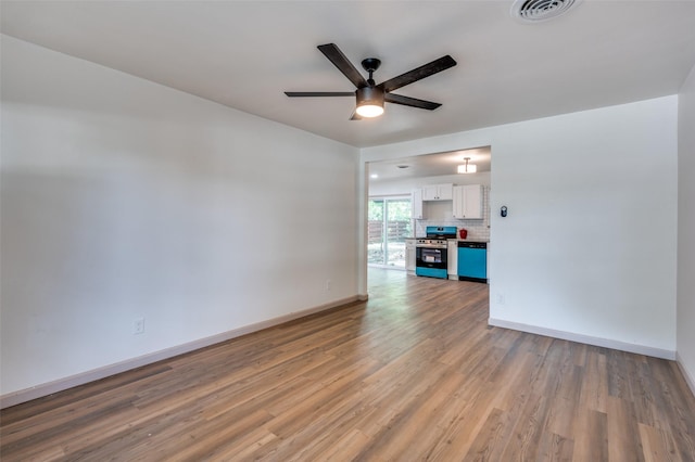 2000 Bettibart St, Fort Worth, TX 76134 - unfurnished living room featuring ceiling fan and light wood-style floors