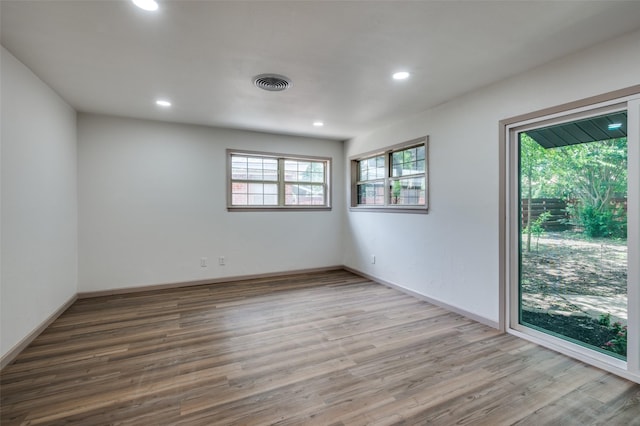 2000 Bettibart St, Fort Worth, TX 76134 - spare room featuring wood finished floors and recessed lighting