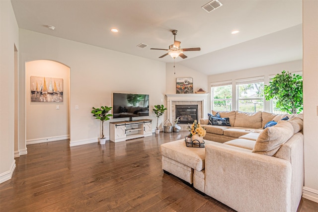 2923 Ash Ave, Melissa, TX 75454 - living area with ceiling fan, dark wood-type flooring, a tiled fireplace, vaulted ceiling, and baseboards