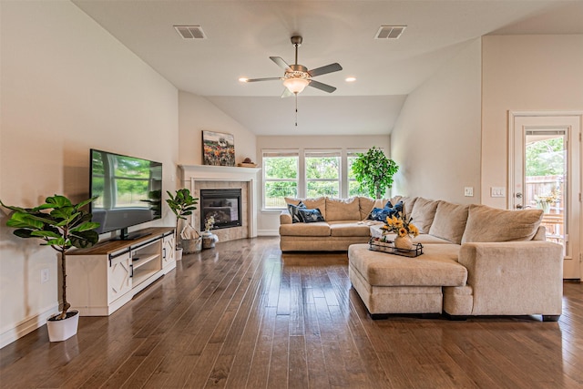 2923 Ash Ave, Melissa, TX 75454 - living room featuring ceiling fan, healthy amount of natural light, vaulted ceiling, dark wood-style flooring, and a fireplace