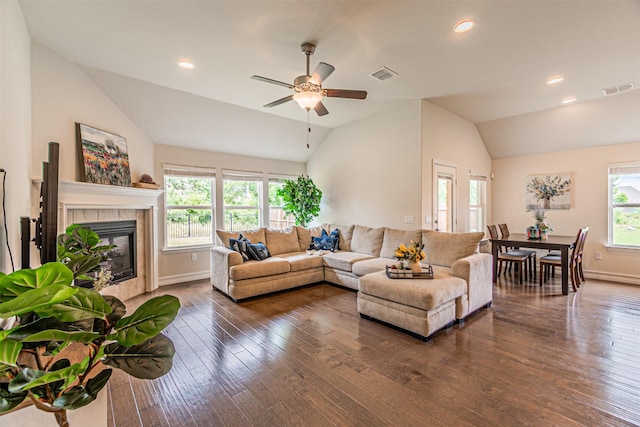 2923 Ash Ave, Melissa, TX 75454 - living area with lofted ceiling, a ceiling fan, a tile fireplace, dark wood finished floors, and baseboards