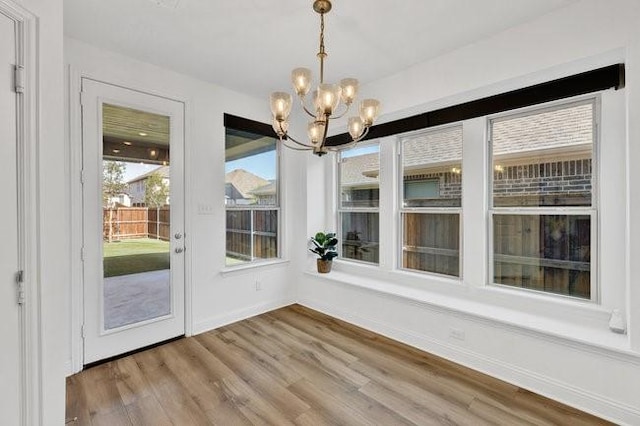 8141 Meadow Valley Dr, Mckinney, TX 75071 - unfurnished sunroom with a chandelier