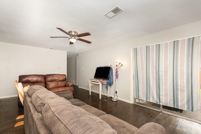 2517 Blanton St, Dallas, TX 75227 - living room with baseboards, ceiling fan, and wood finished floors
