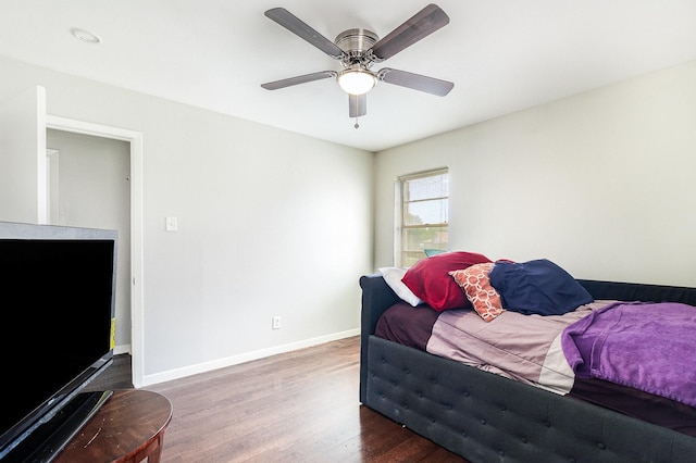 2517 Blanton St, Dallas, TX 75227 - living area with wood finished floors, baseboards, and a ceiling fan