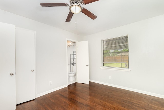 2517 Blanton St, Dallas, TX 75227 - unfurnished bedroom with wood finished floors, baseboards, connected bathroom, and ceiling fan