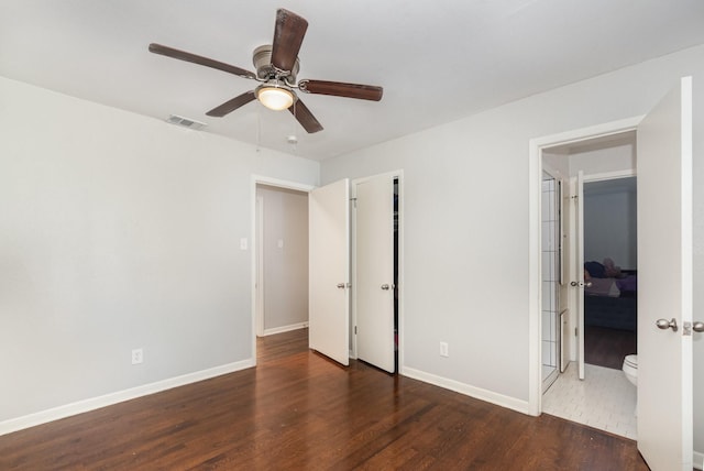 2517 Blanton St, Dallas, TX 75227 - unfurnished bedroom with wood finished floors, baseboards, and a ceiling fan