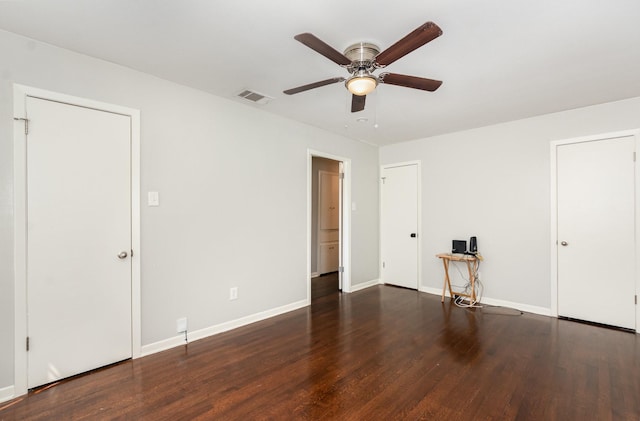 2517 Blanton St, Dallas, TX 75227 - unfurnished bedroom with wood finished floors, baseboards, and a ceiling fan