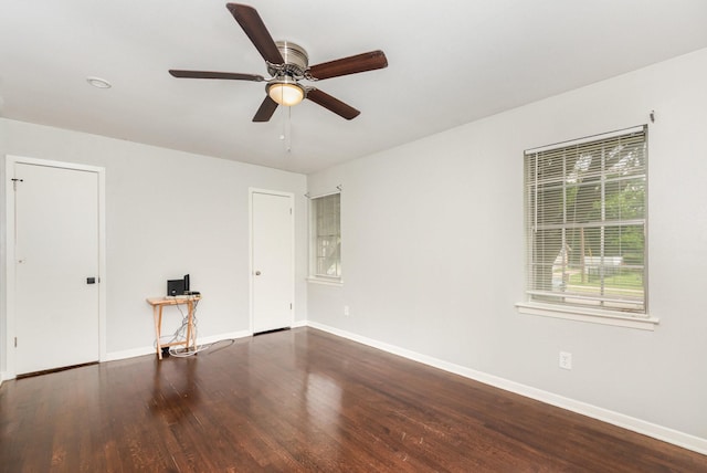 2517 Blanton St, Dallas, TX 75227 - empty room with baseboards, wood finished floors, a ceiling fan, and a desk