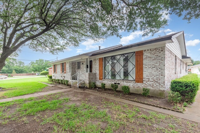 2517 Blanton St, Dallas, TX 75227 - ranch-style house with brick siding and a front lawn