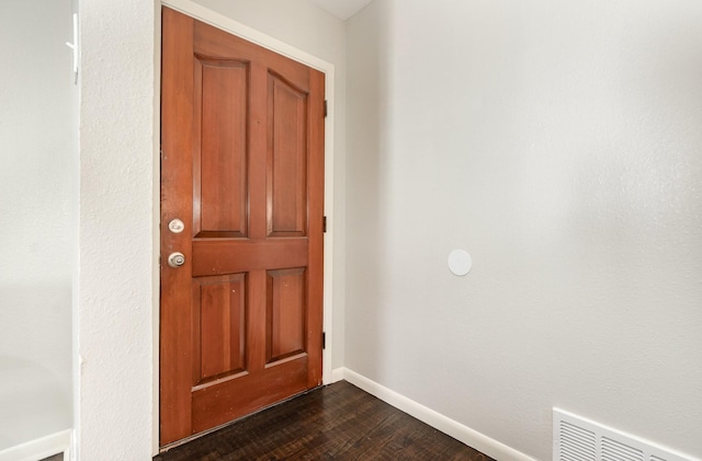 2517 Blanton St, Dallas, TX 75227 - entrance foyer featuring dark wood finished floors and baseboards