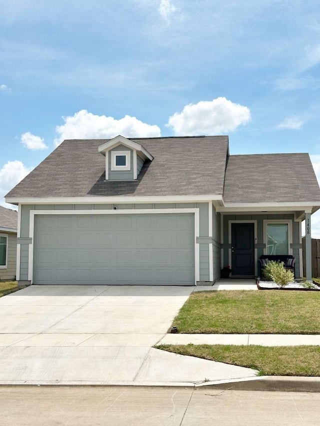 1408 Silver Oak Ln, Fort Worth, TX 76140 - view of front facade with a garage, driveway, and roof with shingles