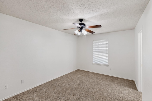 902 Church St, Sanger, TX 76266 - unfurnished room featuring ceiling fan, carpet floors, and a textured ceiling