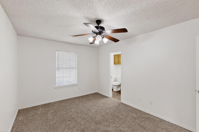 902 Church St, Sanger, TX 76266 - empty room with a ceiling fan, carpet floors, and a textured ceiling