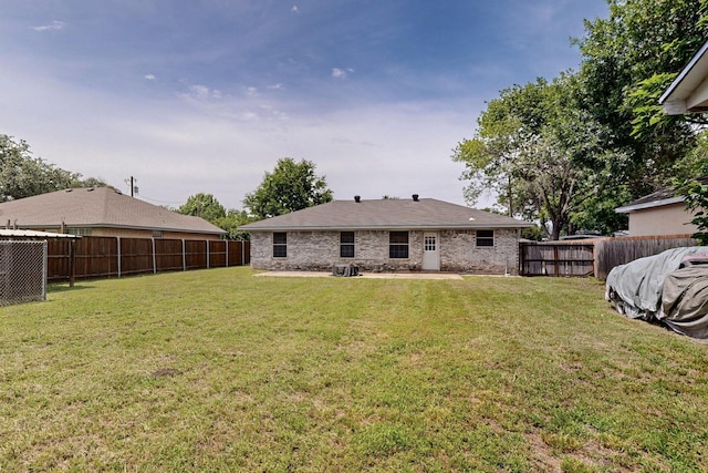 902 Church St, Sanger, TX 76266 - rear view of house featuring a fenced backyard
