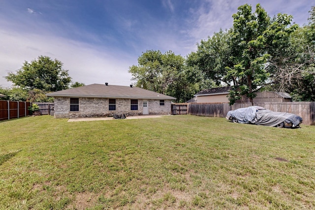 902 Church St, Sanger, TX 76266 - rear view of house featuring a fenced backyard and a patio area