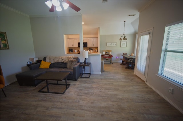 618 Matador Dr, Oak Point, TX 75068 - living room featuring ceiling fan, crown molding, wood finished floors, and baseboards