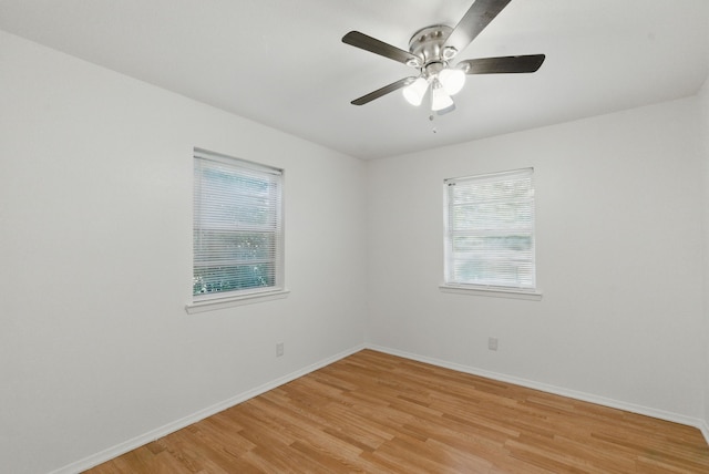 805 S Rusk St, Weatherford, TX 76086 - empty room with light wood-style floors, baseboards, and ceiling fan