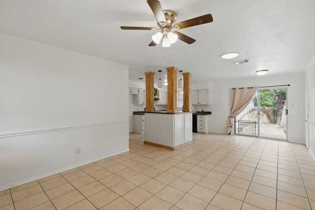 805 S Rusk St, Weatherford, TX 76086 - unfurnished living room featuring ceiling fan, crown molding, and light tile patterned flooring