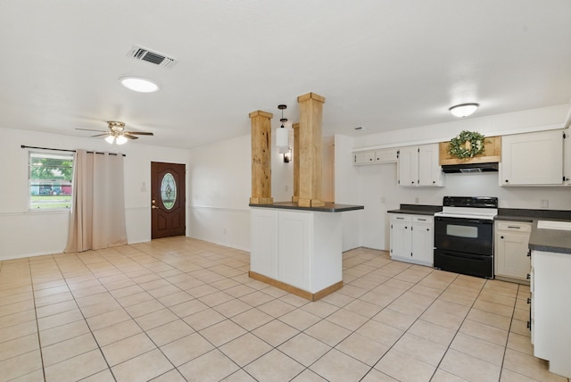 805 S Rusk St, Weatherford, TX 76086 - kitchen featuring black electric range oven, under cabinet range hood, dark countertops, a ceiling fan, and light tile patterned floors