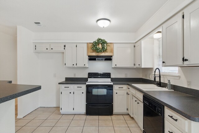 805 S Rusk St, Weatherford, TX 76086 - kitchen with electric range, a sink, black dishwasher, under cabinet range hood, and dark countertops