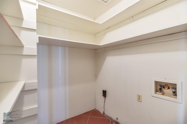 3017 County Road 154, Tuscola, TX 79562 - washroom featuring washer hookup and tile patterned flooring