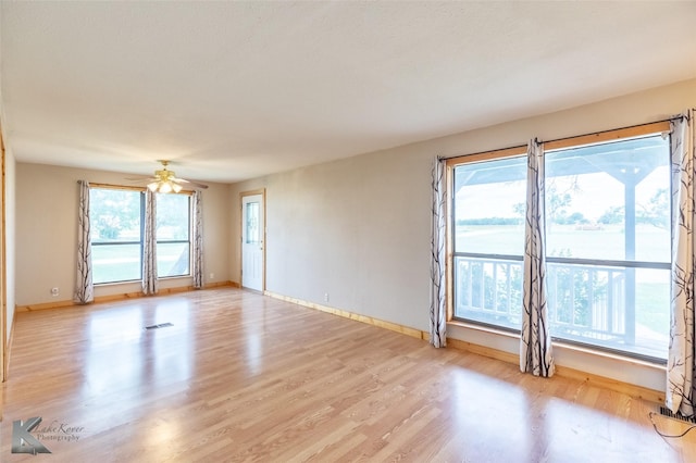 3017 County Road 154, Tuscola, TX 79562 - empty room with light wood-style flooring, a ceiling fan, and baseboards