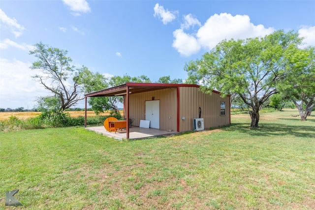 3017 County Road 154, Tuscola, TX 79562 - view of pole building with a lawn and a cooling unit
