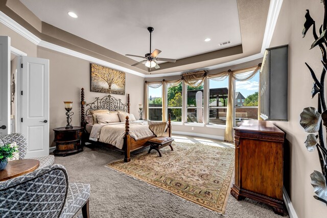 7363 Calla Lilly Ln, Frisco, TX 75034 - bedroom featuring a tray ceiling, carpet flooring, ornamental molding, recessed lighting, and baseboards