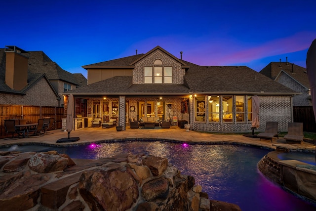 7363 Calla Lilly Ln, Frisco, TX 75034 - view of pool featuring an outdoor living space, a fenced backyard, a pool with connected hot tub, and a patio area