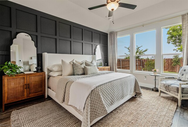 752 Fletcher Dr, Fate, TX 75087 - bedroom featuring a decorative wall, wood finished floors, and a ceiling fan