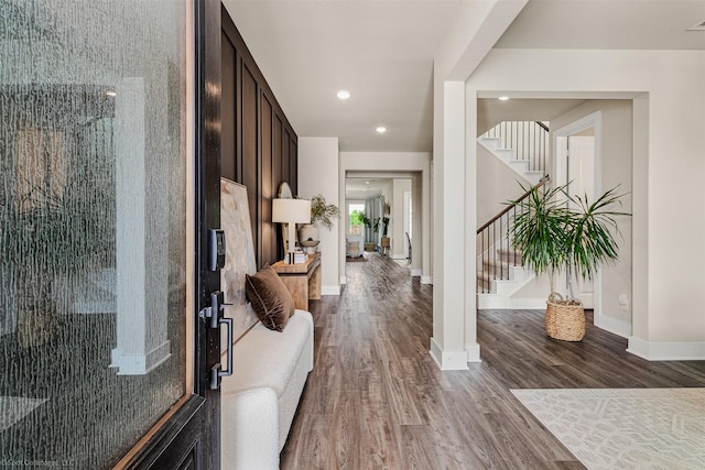 752 Fletcher Dr, Fate, TX 75087 - hallway with stairway, wood finished floors, baseboards, and recessed lighting