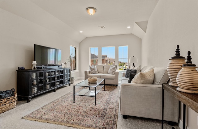 752 Fletcher Dr, Fate, TX 75087 - carpeted living room featuring vaulted ceiling and recessed lighting
