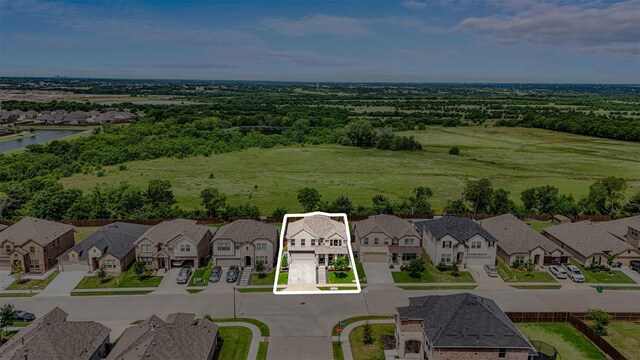 752 Fletcher Dr, Fate, TX 75087 - aerial perspective of suburban area featuring property boundaries highlighted
