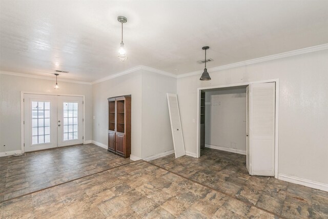 133 SE Newton Dr, Burleson, TX 76028 - unfurnished room featuring french doors, stone finish flooring, ornamental molding, and baseboards