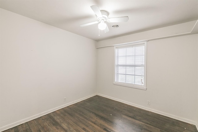 133 SE Newton Dr, Burleson, TX 76028 - unfurnished room with baseboards, dark wood-type flooring, and ceiling fan