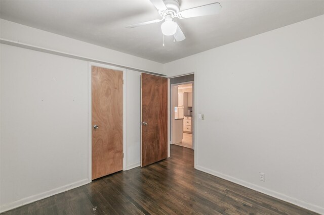 133 SE Newton Dr, Burleson, TX 76028 - unfurnished bedroom featuring dark wood-type flooring, baseboards, and ceiling fan