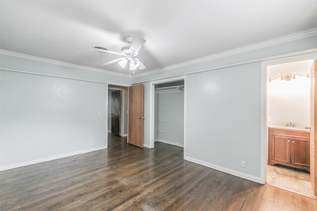 133 SE Newton Dr, Burleson, TX 76028 - unfurnished bedroom featuring dark wood finished floors, crown molding, baseboards, a closet, and ensuite bath