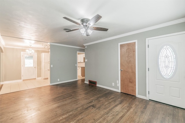 133 SE Newton Dr, Burleson, TX 76028 - entryway featuring a ceiling fan, wood finished floors, baseboards, and crown molding