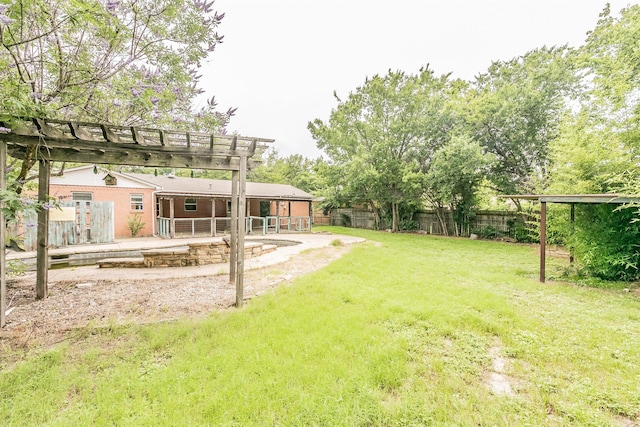 133 SE Newton Dr, Burleson, TX 76028 - view of yard featuring a patio and a pergola