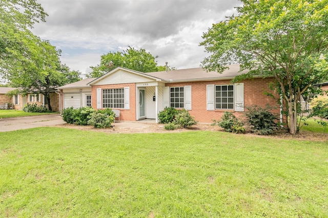 133 SE Newton Dr, Burleson, TX 76028 - ranch-style house with brick siding, an attached garage, and a front yard