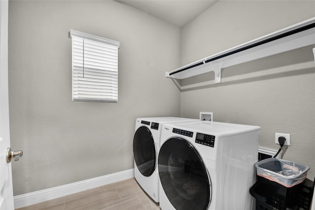 9100 Cacti Ct, Fort Worth, TX 76036 - washroom with independent washer and dryer and baseboards